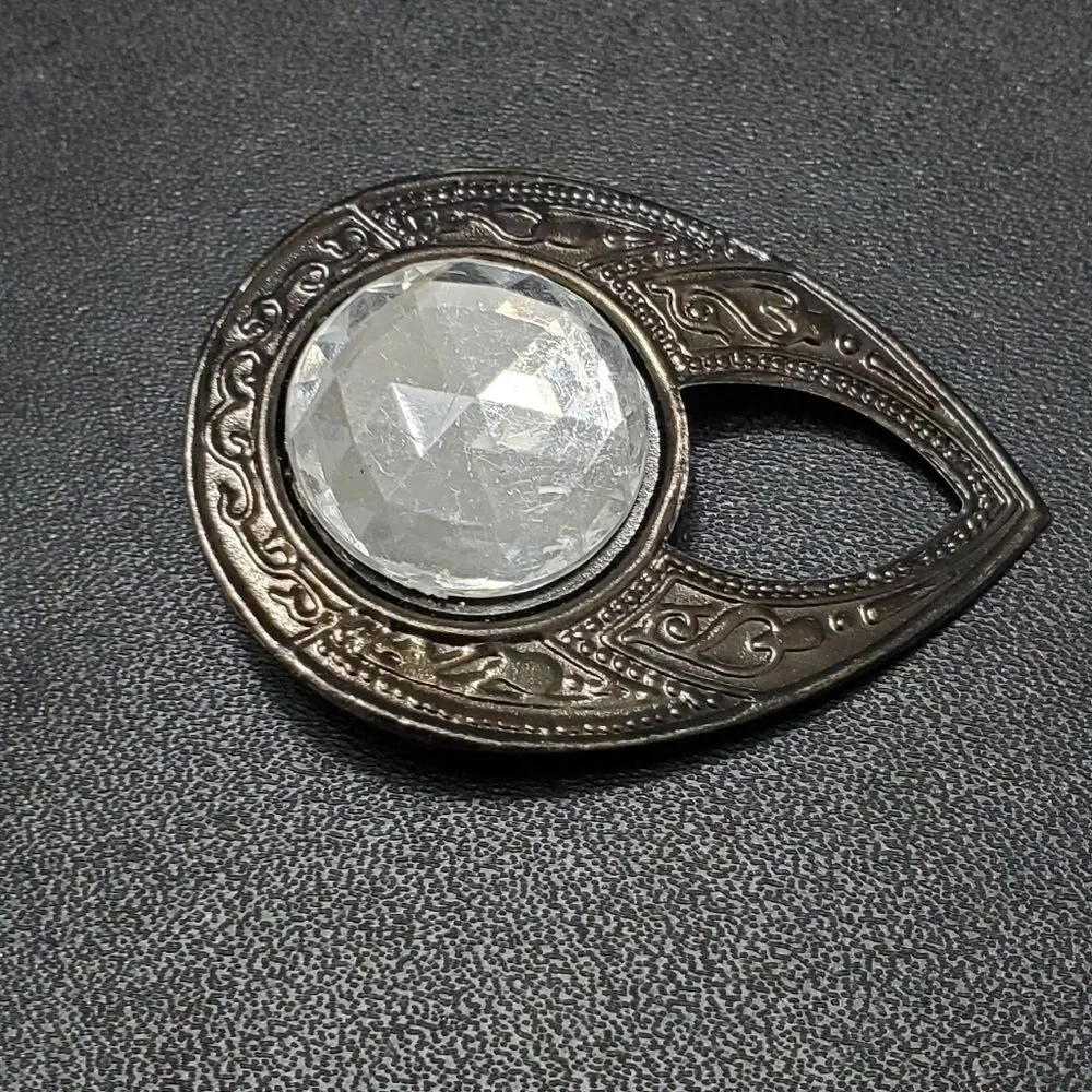Dark silver tone rhinestone teardrop shaped brooch